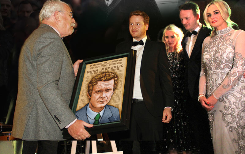 Family of Martin McGuinness receiving portrait